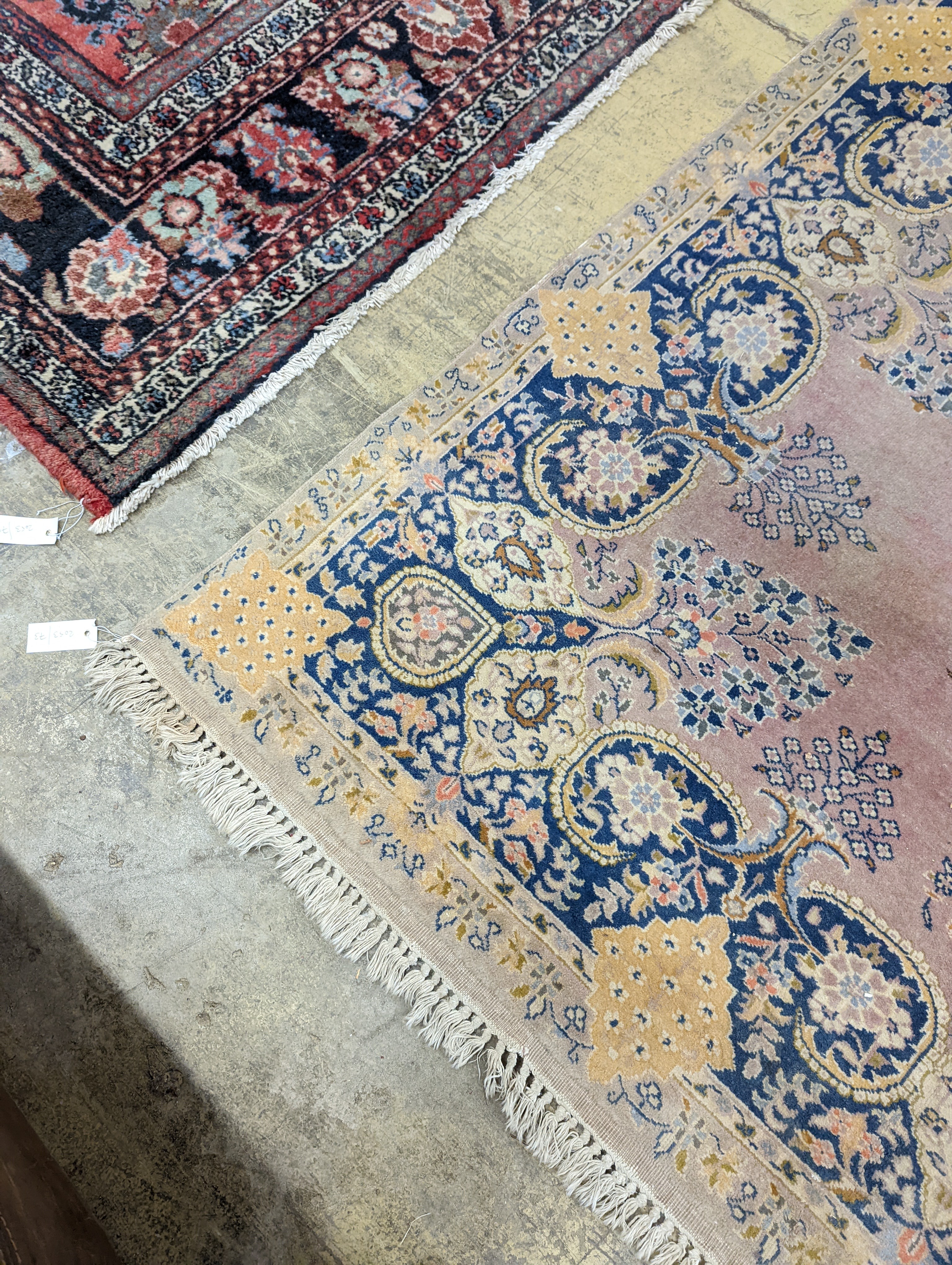 A North West Persian design peach ground carpet, 250 x 170cm